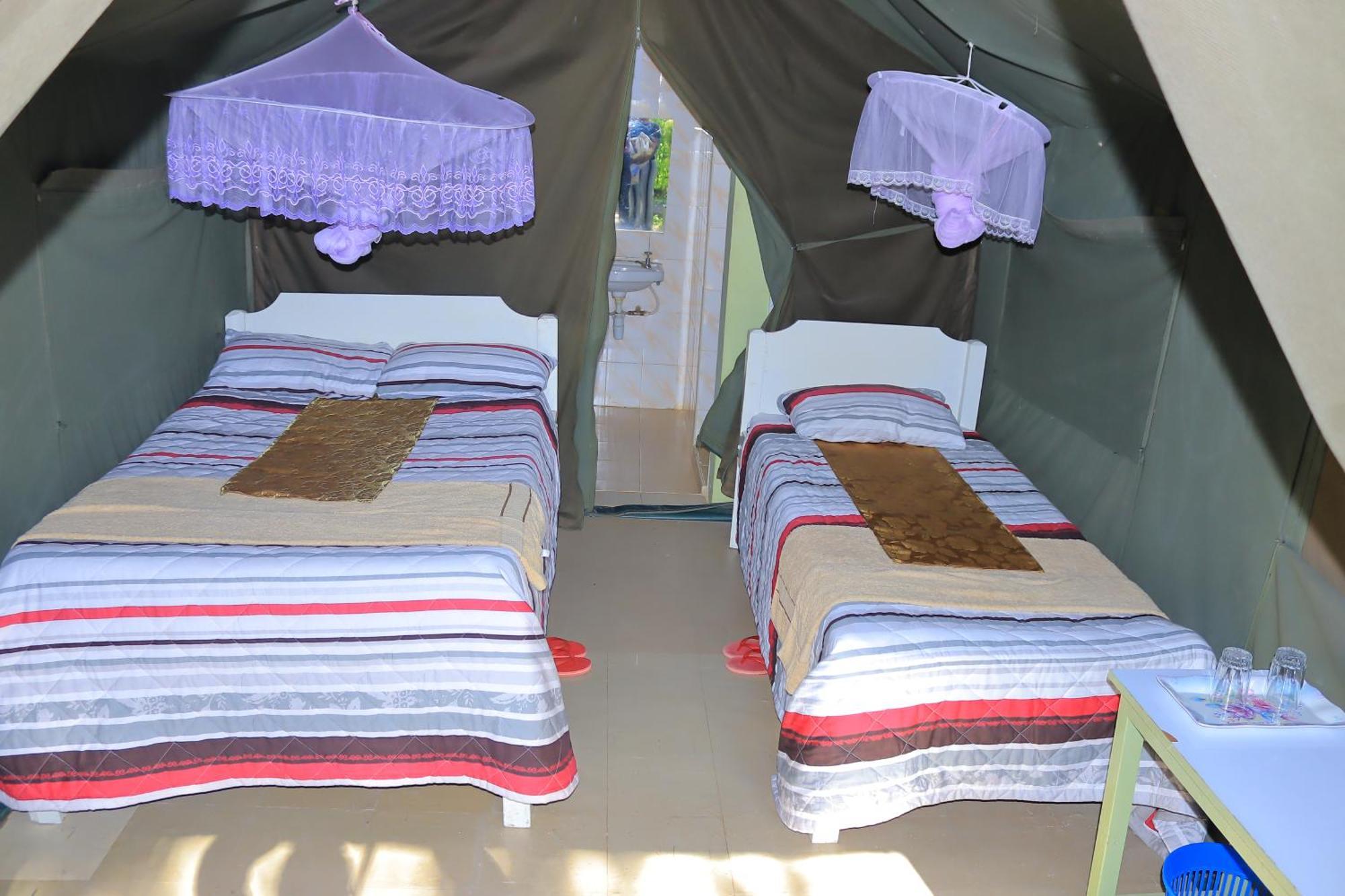 Отель Rhino Tourist Camp Ololaimutiek Экстерьер фото