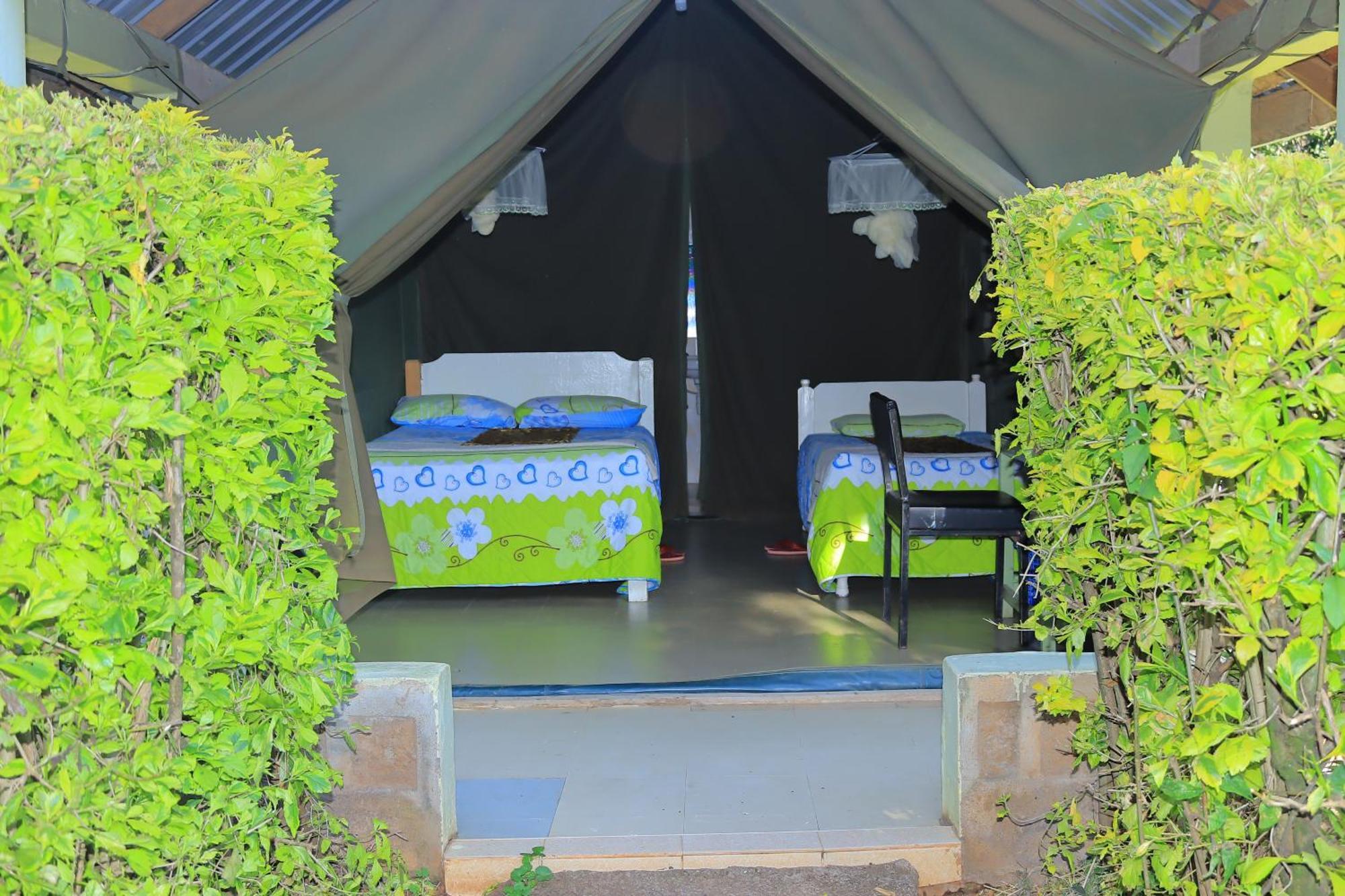 Отель Rhino Tourist Camp Ololaimutiek Экстерьер фото